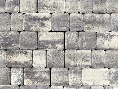 Background of gray and white paving stones, pattern Stock Photos