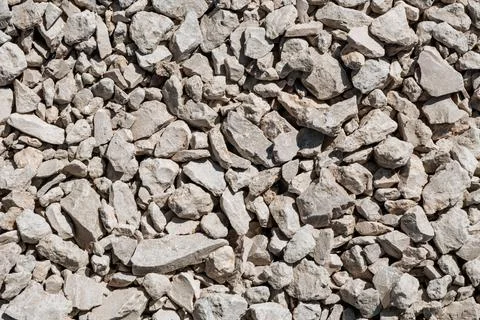 Background of gray crushed stone different forms Foto stock