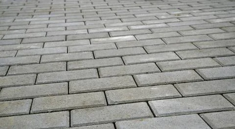 Background of gray interlocking tiles Stock Photos