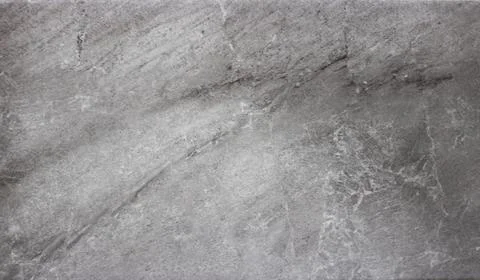 Background of gray marble tiles in close-up. Grey marble tile texture Stock Photos
