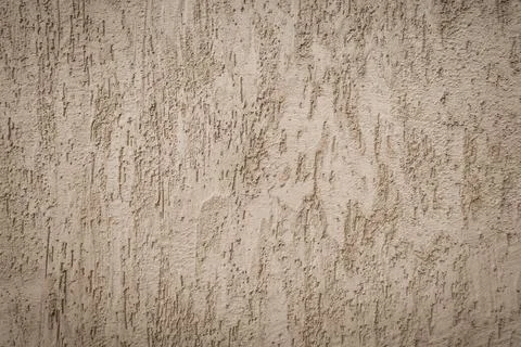 Background of gray one-color facade plaster. Single-layer cement monolithic Stock Photos