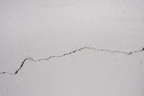 Background of gray plaster with a crack Stock Photos