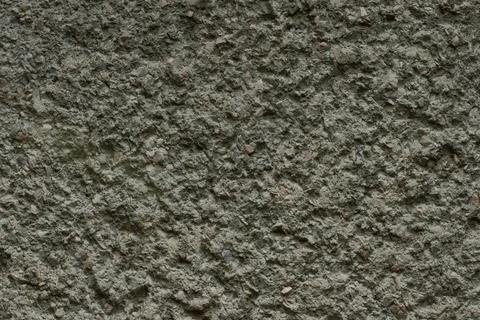 Background, gray plaster texture for the exterior walls of the house. Stock Photos