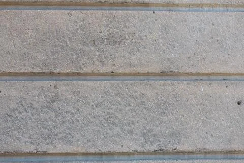 Background of gray stone wall made with blocks . Pattern of slate wall textur Stock Photos