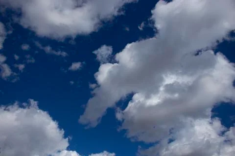 Background, gray white clouds on blue sky background Stock Photos