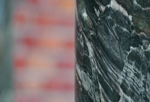 The background of the green marble structure with streaks and cracks is close Stock Photos