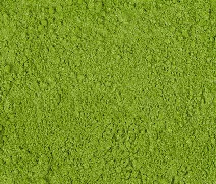 Background of green powder, border surface close up of powdered green tea Stock Photos