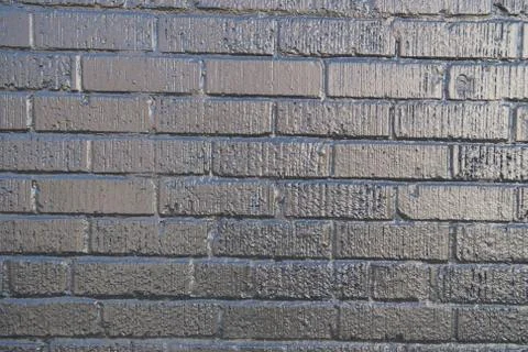 Background Grey brick wall up close Foto stock