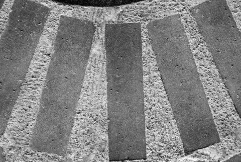 Background with grey stone bricks. Stock Photos