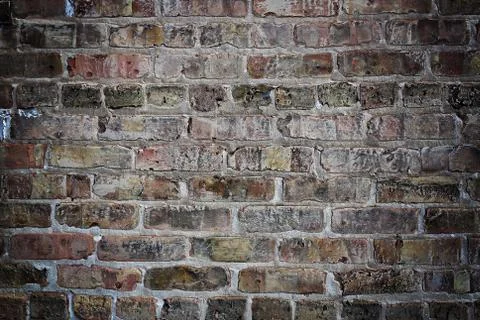 Background of Grey Weathered Brick and Mortar Stone Wall with Vignette Stock Photos