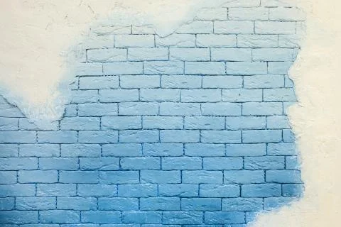 Background of grunge brick wall with plaster Stock Photos