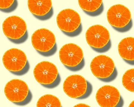 Background of half cut oranges. Stock Photos