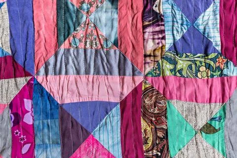 Background from hand-crafted silk patchwork cloth Stock-Fotos