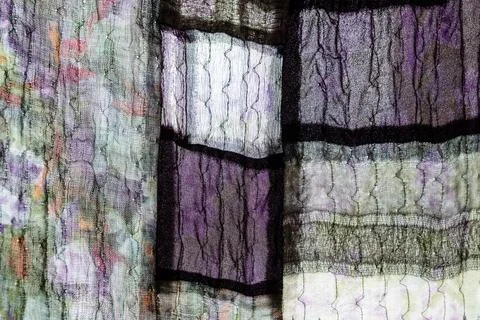 Background from hand sewn silk patchwork cloth Stock Photos