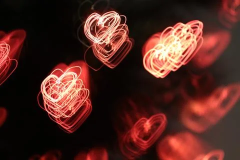 Background with heart-shaped lights Stock Photos