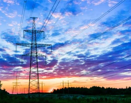 Background of the high-voltage tower in the sunset Stock Photos