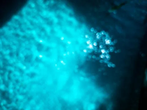 Background image, blurry blue pool, circle bokeh and dark shadows. Фото