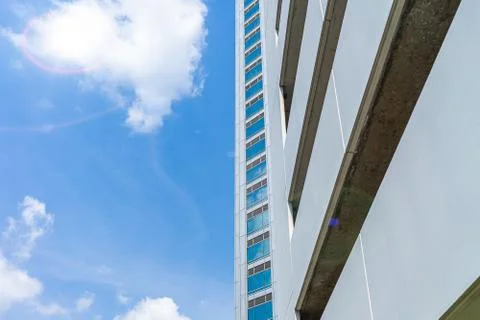 Background image of bright sky and tall buildings Stock Photos