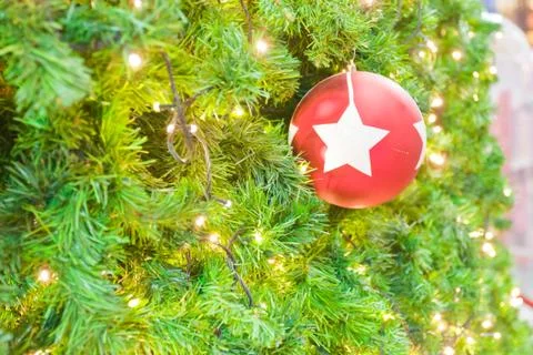 Background image of a christmas tree decorated with lights Stock Photos