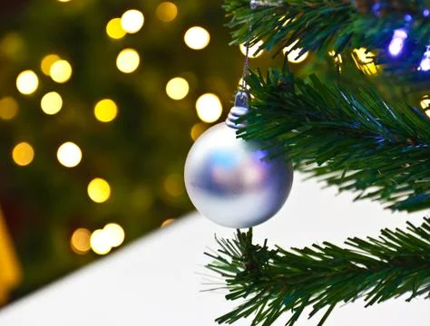 Background image of a christmas tree decorated with lights Stock Photos