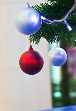 Background image of a christmas tree decorated with lights Stock Photos