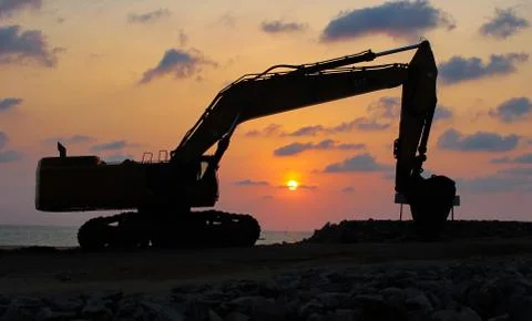 Background image of construction site during sunset Фото
