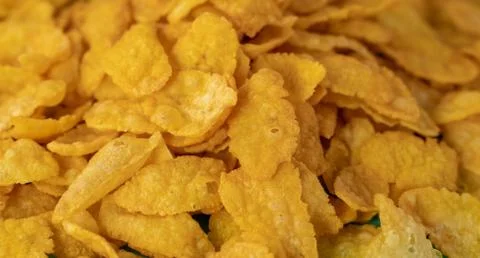 Background image of corn flakes on a table Photos