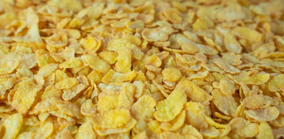 Background image of corn flakes on a table Photos