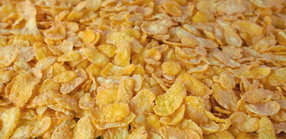 Background image of corn flakes on a table Stock Photos