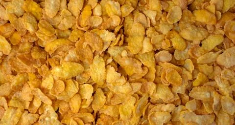 Background image of corn flakes on a table Photos