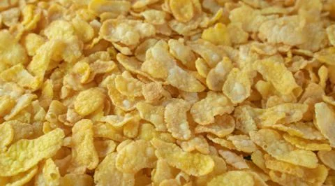 Background image of corn flakes on a table Stock-Fotos