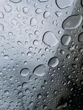 Background image drops on glass Stock Photos