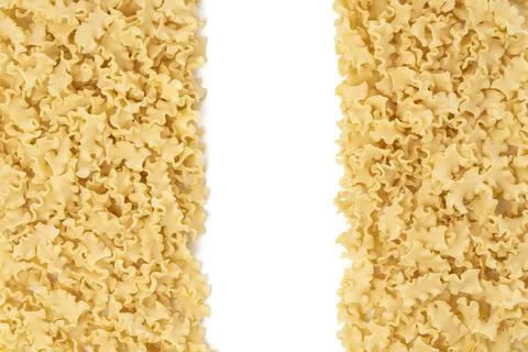 Background image with dry mini lasagna noodles with copy space on the center Stock Photos