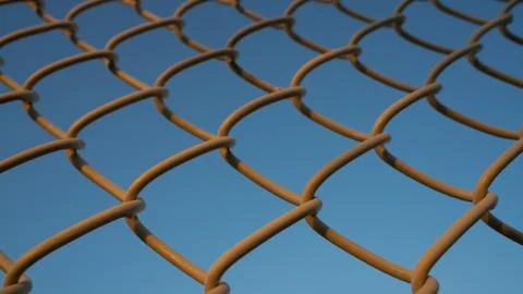 Background image of a garden chain link fence Stock Photos
