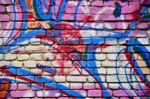 Background image with graffiti elements. Texture of the wall, painted in diff Stock Photos
