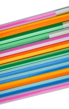 A background image made with many different colored wood pencil crayons Stock Photos