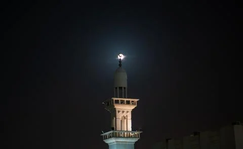 Background image of mosque minaret during full moon night Stock-Fotos