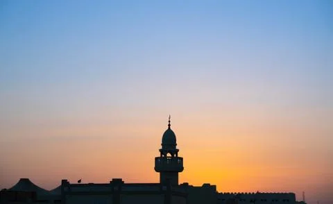 Background image of mosque minaret during sunset Stock-Fotos