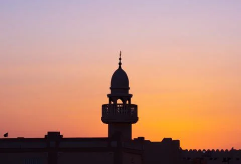 Background image of mosque minaret during sunset Stock-Fotos