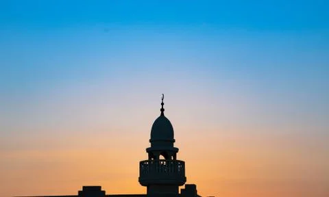 Background image of mosque minaret during sunset Stock-Fotos