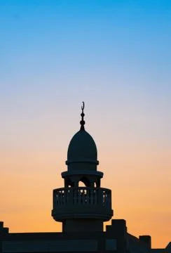 Background image of mosque minaret during sunset Stock Photos