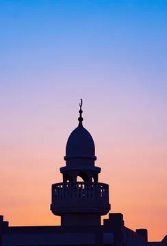 Background image of mosque minaret during sunset Stock Photos
