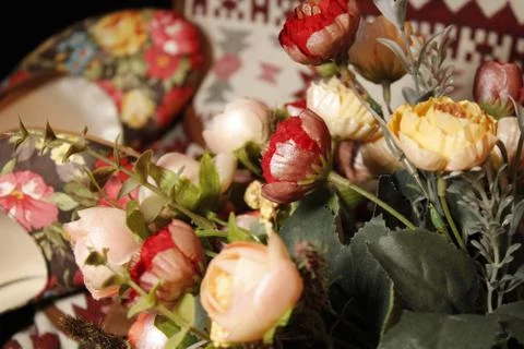 Background image of objects in crimson and beige tones. Stock Photos