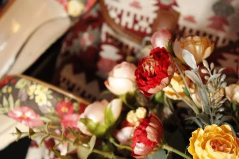 Background image of objects in crimson and beige tones. Stock Photos
