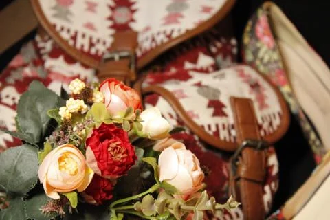 Background image of objects in crimson and beige tones. Stock Photos