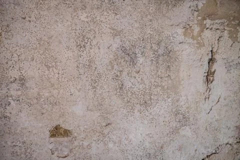 Background image of an old stucco wall that is very well aged Fotos Stock