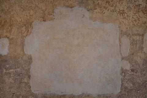 Background image of an old stucco wall that is very well aged Photos