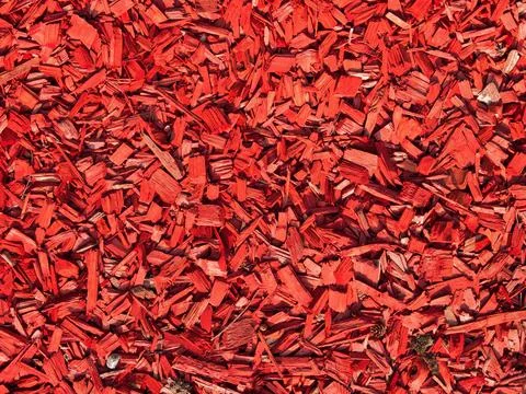 Background image of a pattern of red small pieces of wood Stock-Fotos