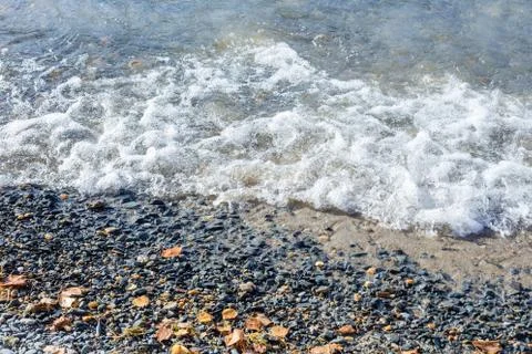 Background image of pebbles on a beach Stock Photos