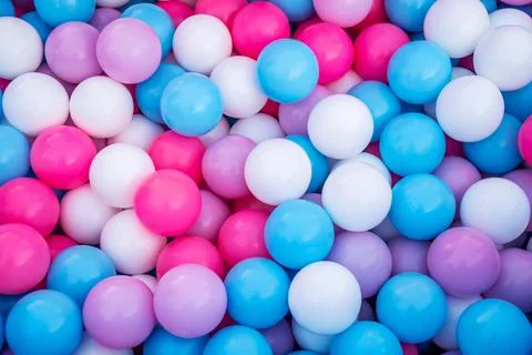 Background image, plastic balls of different colors, multi-colored balls Stock Photos